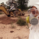 ITX Petroleum officials bury drums of toxic runoff.